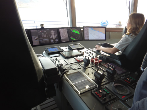 Navigator Natalia driving the ship